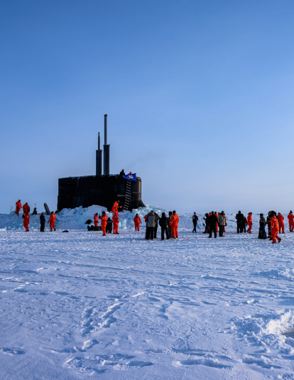 The crew of the Seawolf-class fast-attack submarine, USS Connecticut (SSN 22), enjoys ice liberty after surfacing in the Arctic Circle during Ice Exercise (ICEX) 2020. ICEX 2020 is a biennial submarine exercise which promotes interoperability between allies and partners to maintain operational readiness and regional stability, while improving capabilities to operate in the Arctic environment.