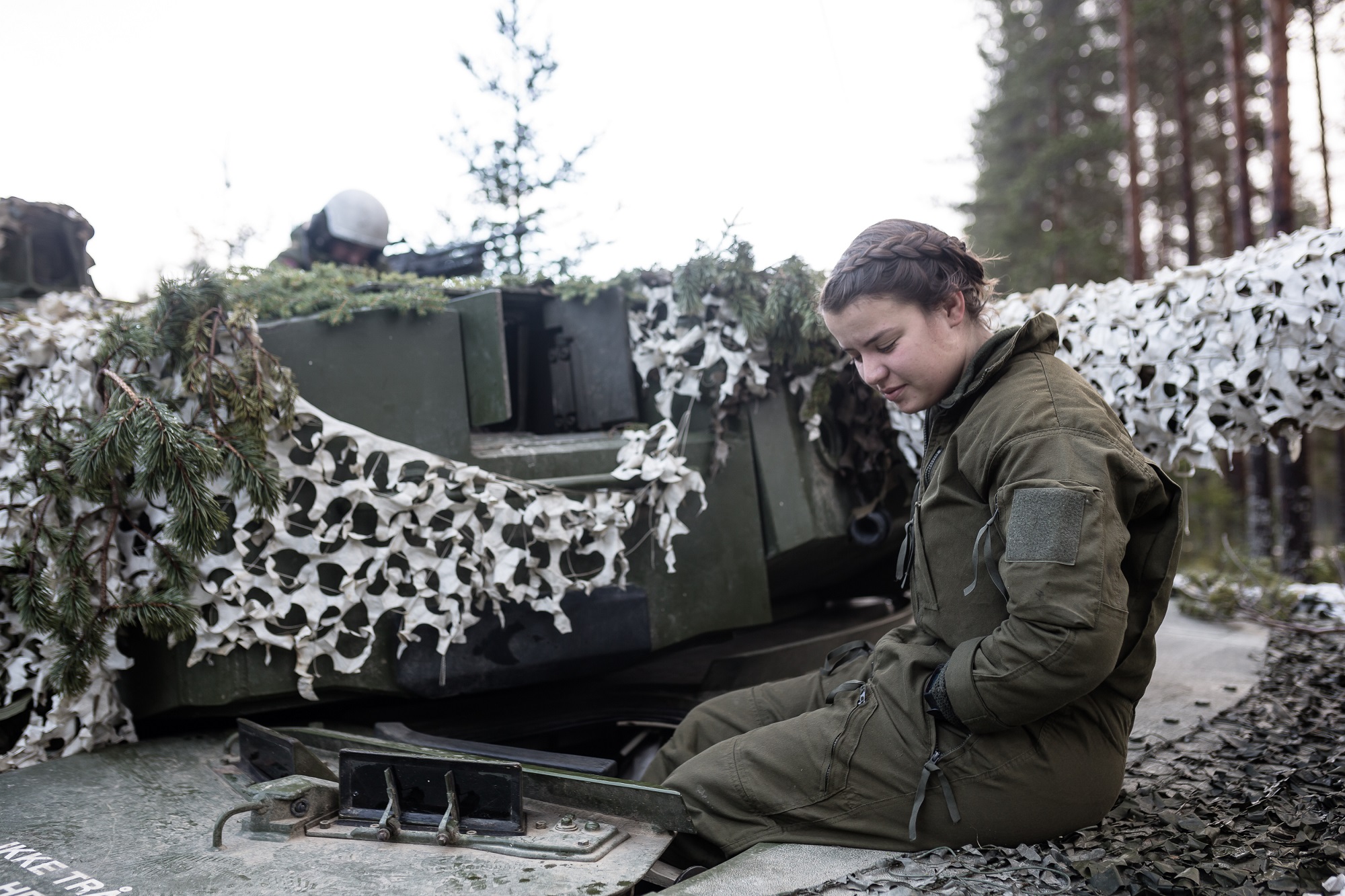 The members of a Norwegian Leopard 2A4 in defensive posture as wait for order to advance against British and Danish troops during the live exercise on November 3, 2018 in Elval, Norway.