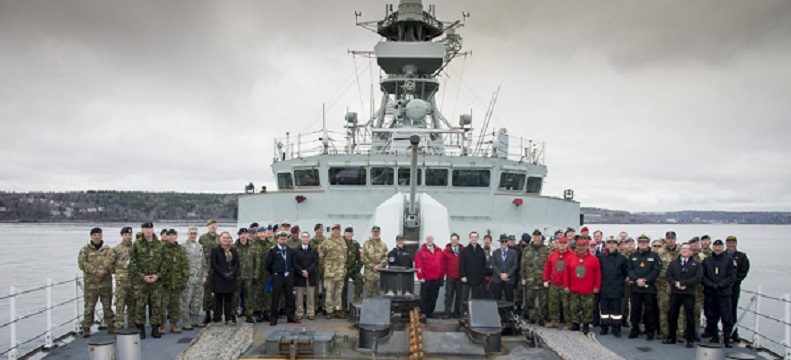 Halifax, Nova Scotia. May 1, 2018 - Members of the Arctic Security Forces Round Table, gather on the forecastle of Her Majesty's Canadian Ship (HMCS) Ville De Quebec. (Photo by: Able Seaman John Iglesias, Formation Imaging Services)