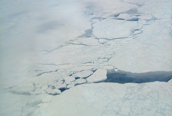 A new airborne study with NASA contributions measured surprising levels of the potent greenhouse gas methane coming from cracks in Arctic sea ice and areas of partial sea ice cover. This image was taken over the Arctic Ocean at a latitude of approximately 71 degrees North on April 15, 2010.