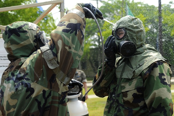 South Korean airmen assist in mask washing decontamination