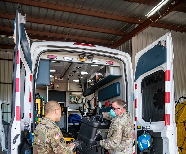 CHARLESTON, W.Va. - Members of the West Virginia National Guard perform COVID-19 decontamination of first responder vehicles with an Aerosolized Hydrogen Peroxide system at Yeager Airport, Charleston, West Virginia, April 14, 2020. The method will be used to sanitize more than 250 police vehicles and ambulances in the area.