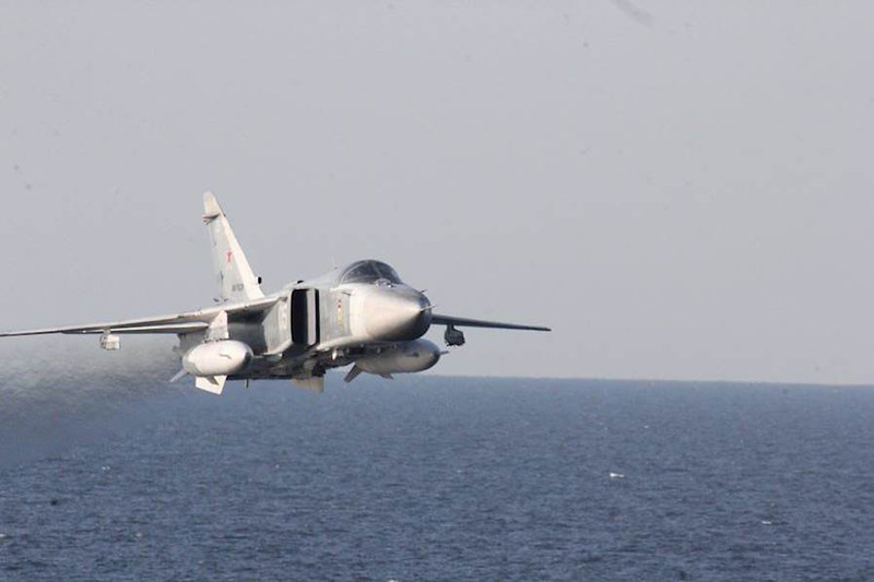 A Russian Sukhoi Su-24 attack aircraft makes a low altitude pass by USS Donald Cook (DDG 75) April 12, 2016.