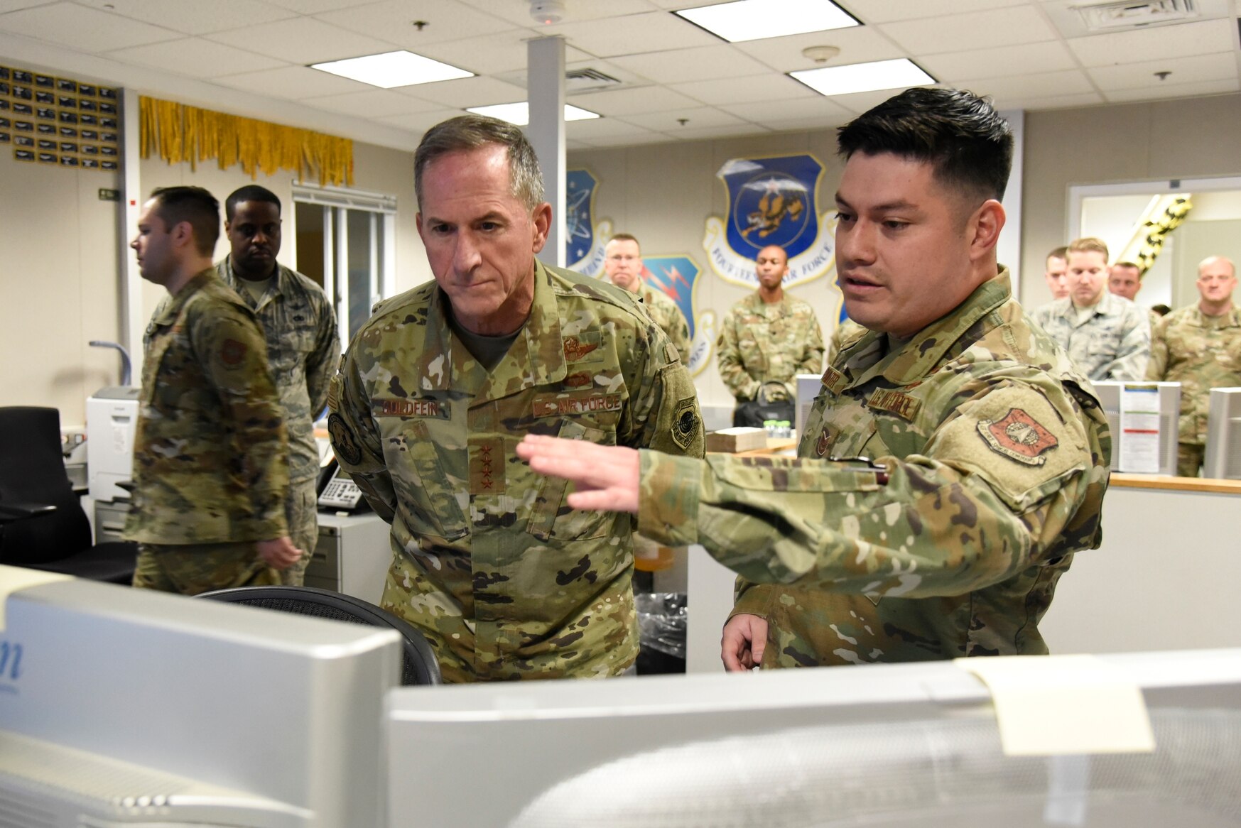 U.S. Air Force Chief of Staff Gen. Dave Goldfein is briefed by an airman from the 12th Space Warning Squadron at Thule Air Base, 