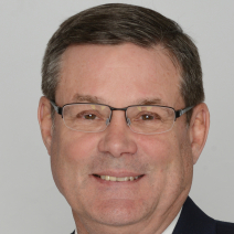 A portrait photograph of professor Robert E. Knotts.