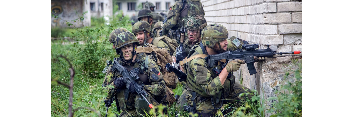 NATO soldiers perform military exercises.