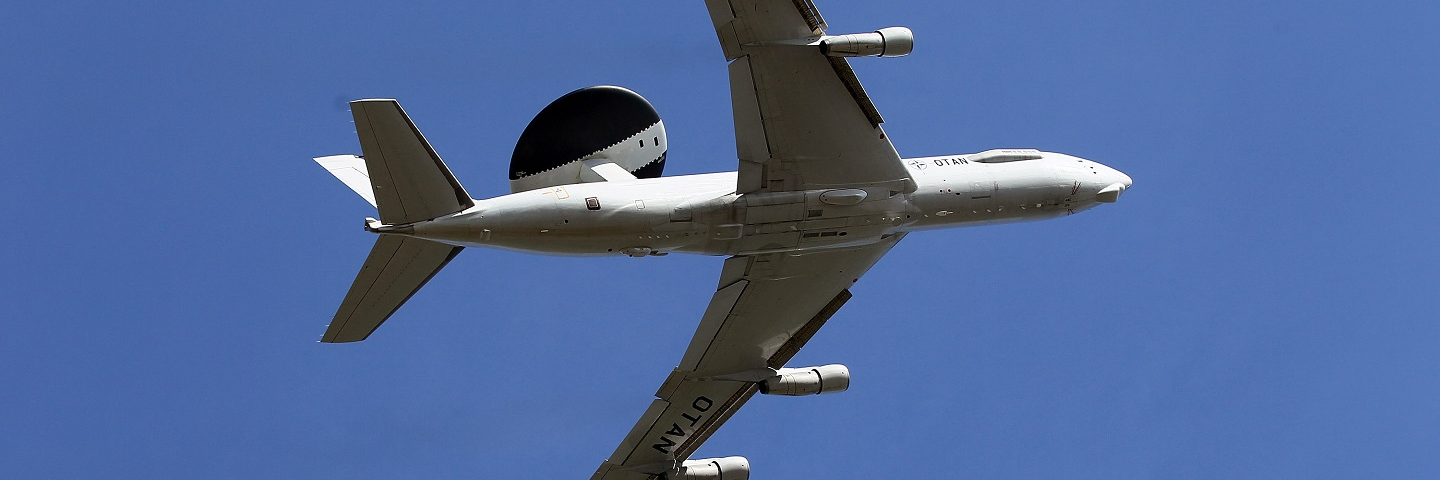 GEILENKIRCHEN, GERMANY - MARCH 14: A NATO E-3A airborne warning and control system (AWACS) aircraft takes off from the NATO air base on March 24, 2011 at Geilenkirchen, Germany. 