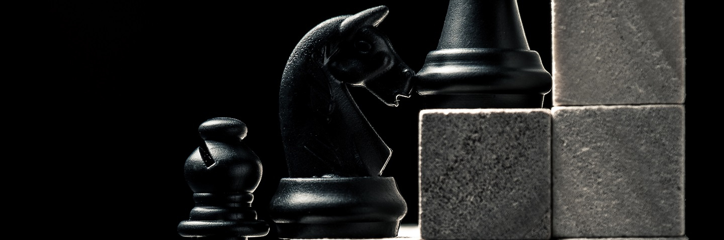 A photo of chess pieces. 