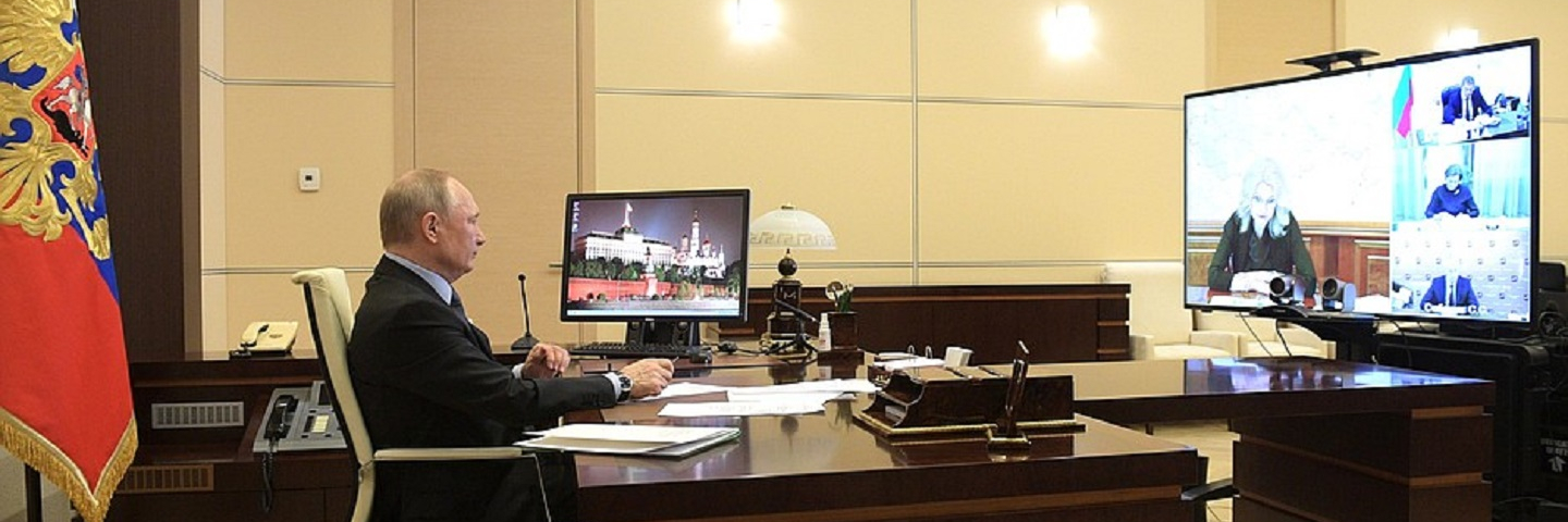Photo of President Putin in a video confrence for COVID-19.