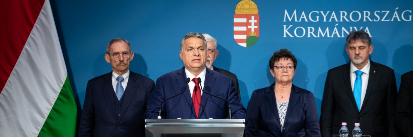 Orban is giving a speech, the operational tribe is around him.