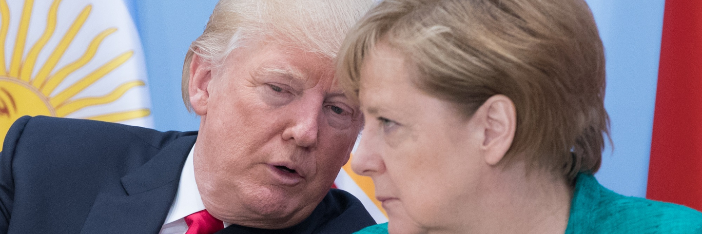 A photograph of German Chancellor Angela Merkel (R) and US President Donald Trump attend a panel discussion titled 'Launch Event Women's Entrepreneur Finance Initiative' on the second day of the G20 summit on July 8, 2017 in Hamburg, Germany.