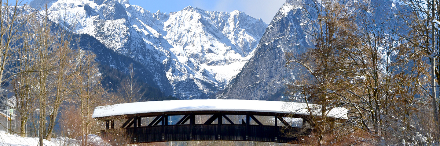 Graphic with bridge over Loisach river and mountains in background