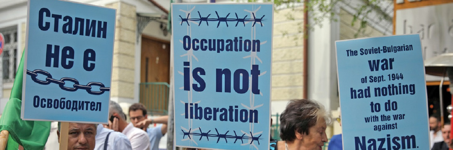 People protest an exhibition backed by Russia’s embassy in Bulgaria titled “75 years since the liberation of Eastern Europe from Nazism,” in Sofia, Bulgaria, in September 2019.