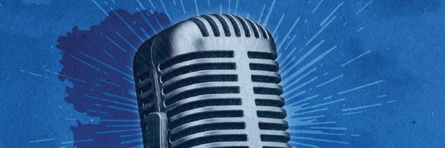 Photo of an electrostatic microphone with a smoky blue background.