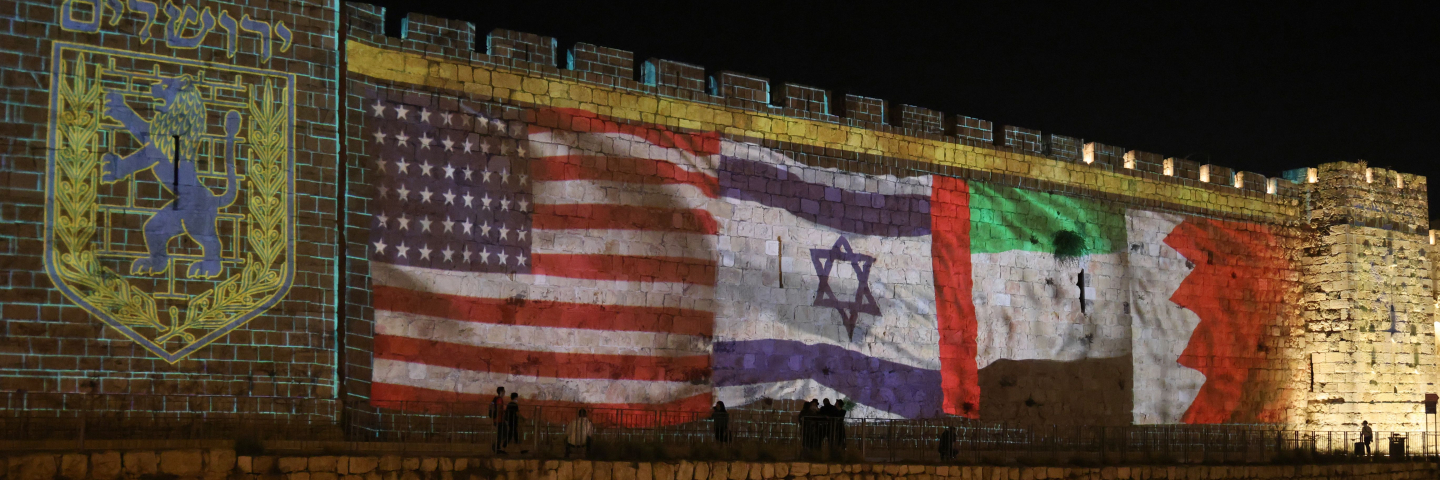 The flags of US, Israel, United Arab Emirates, and Bahrain are projected on the ramparts of Jerusalem's Old City on September 15, 2020 in a show of support for Israeli normalisation deals with the United Arab Emirates and Bahrain.