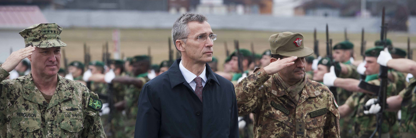 North Atlantic Treaty Organization (NATO) Secretary General Jens Stoltenberg (C) reviews an honor guard of the NATO-led peacekeeping mission in Kosovo (KFOR) in Pristina during his first visit to Kosovo on January 23, 2015.