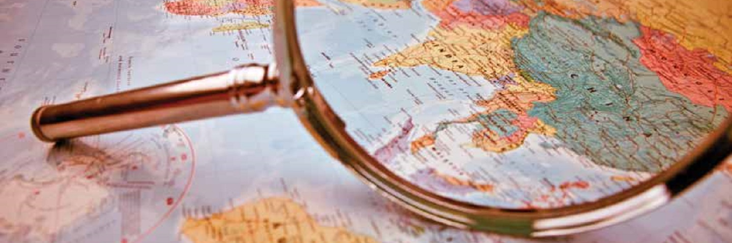 magnifying glass on map of the east