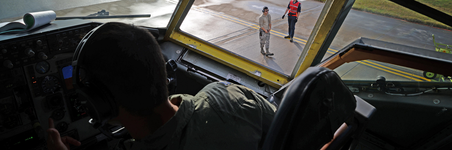U.S. Air Force KC-135 Stratotanker crew chiefs wait as aircrew members conduct pre-flight checks in support of Exercise Noble Arrow, Oct. 14, 2016, on RAF Mildenhall, England. Developed to train NATO forces through air operations in a realistic high-threat environment, the exercise provide component-level force integration training for NATO Response Force assigned units.
