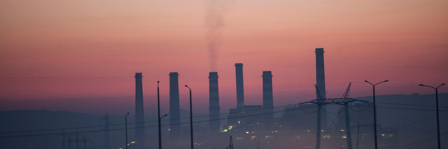 This photograph taken on January 29, 2018, shows smoke rising from chimneys of the Kosovo power plant near the town of Obiliq on the outskirts of Pristina. Every winter morning workers wrap scarves around their faces and emerge from the pea soup fog that engulfs their town of Obiliq, stuck between two coal-fired power stations on the outskirts of Kosovo's capital.