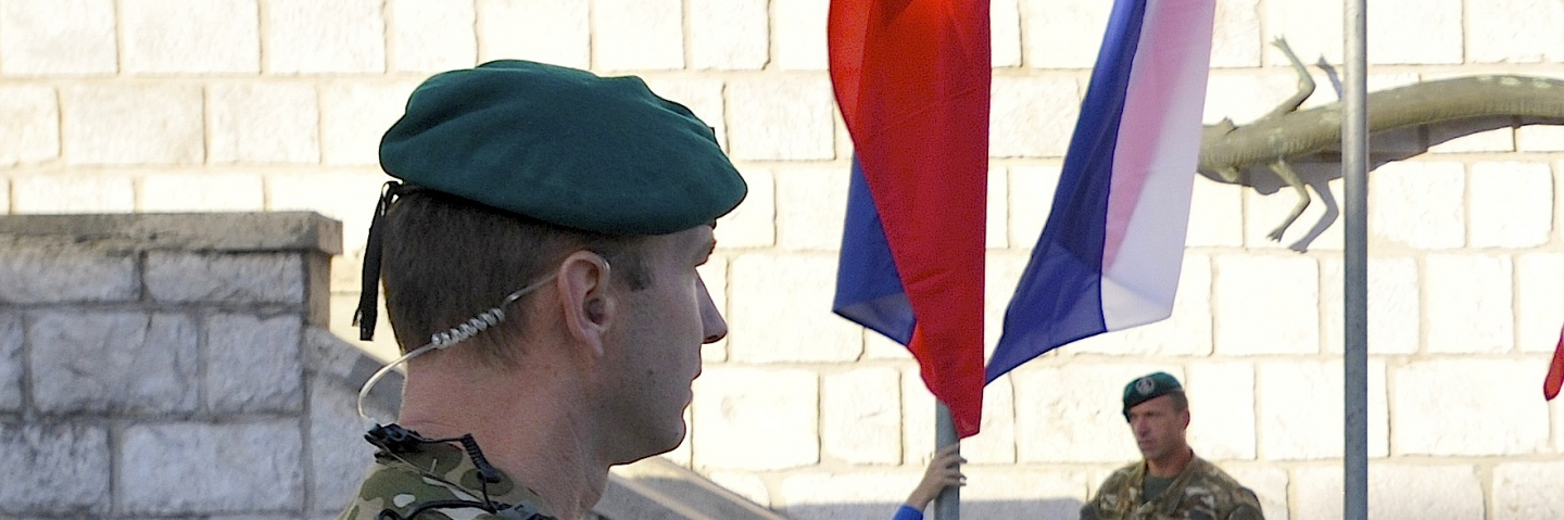alabnian soldier with flag of Albania and Croatia