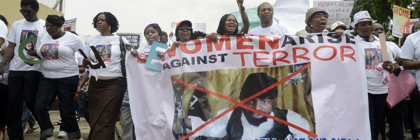 Women Arise civil society led by Joe Odumakin (C) accompanied by afro-beat musician Femi Anikulapo Kuti demonstrate to press for the release of missing Chibok school girls in Lagos on May 12, 2014.