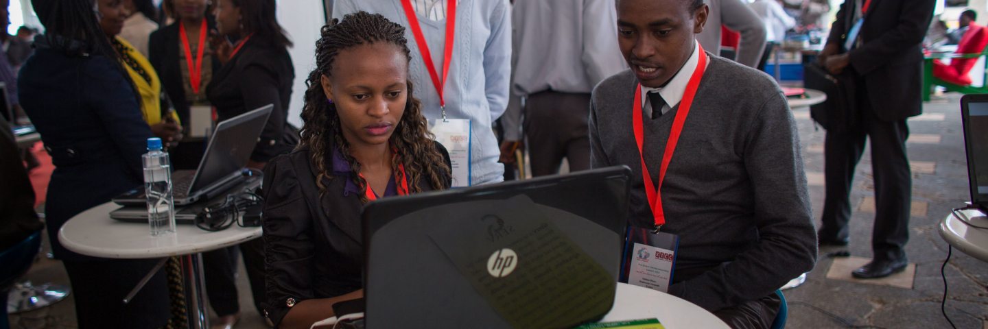 Kenyans working on computer