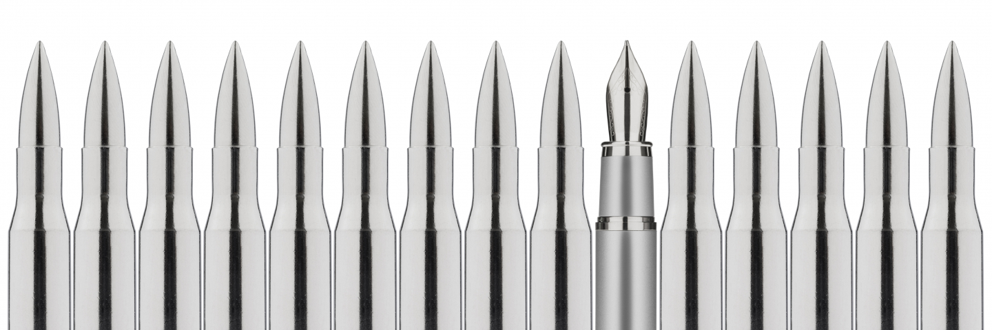 A row of bullets with one fountain pen.