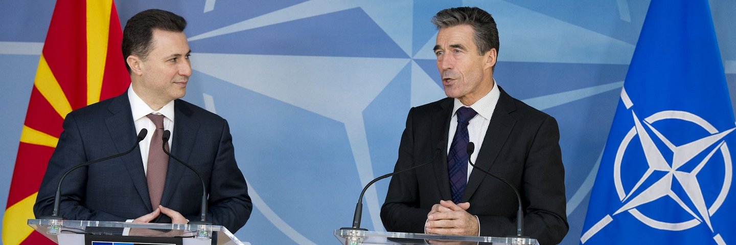 NATO Secretary General, Mr. Anders Fogh Rasmussen and the Prime Minister of the former Yugoslav Republic of Macedonia, Mr. Nikola Gruevski, standing at podiums with flags behind them.