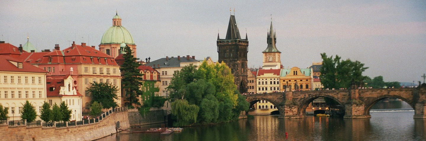View of the river, bridge and buildings in Prague, Czech Republic.