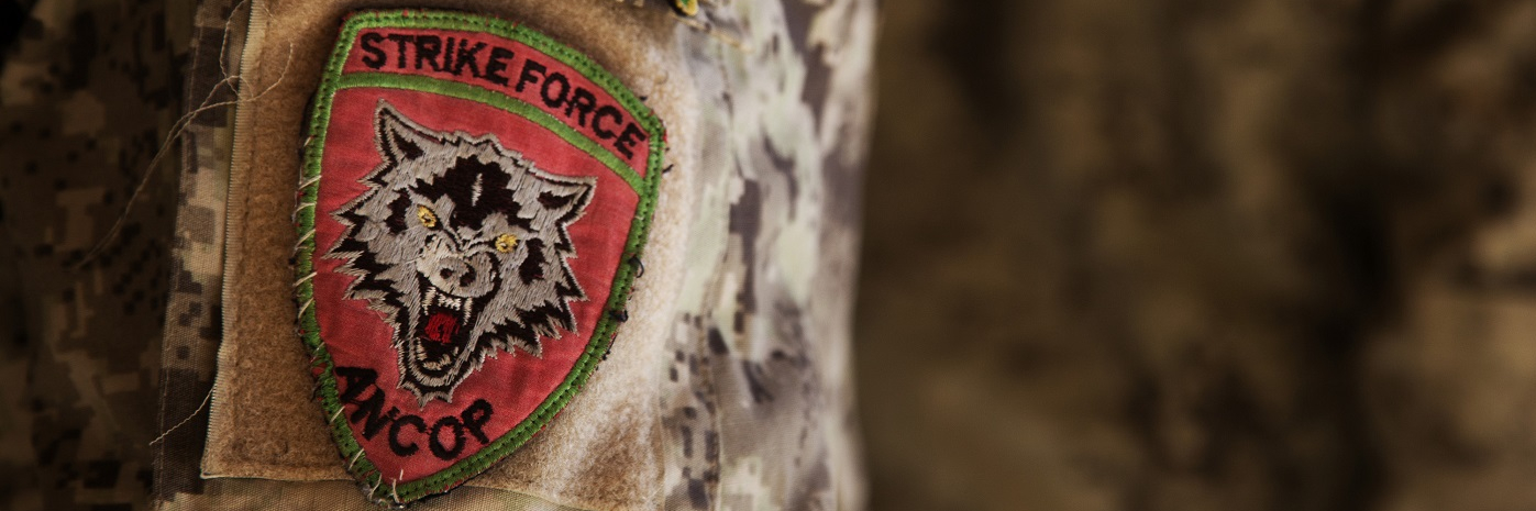 Close up photo of the arm patch of the Afghan National Civil Order Policemen (ANCOP).