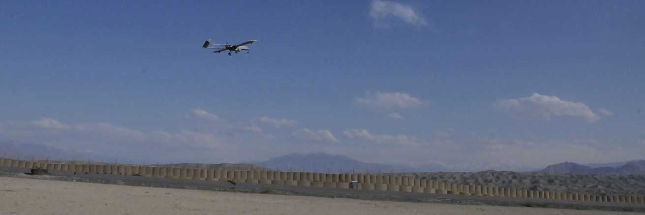 A RQ-7B Shadow unmanned aerial vehicle launches into the sky from the flight line at Combat Outpost Xio Haq in Afghanistan.