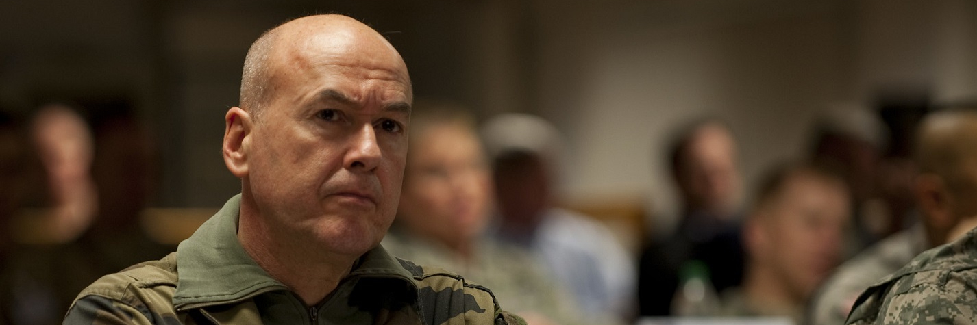 French Maj Gen Jean Fred Berger, commander of NATO’s Joint Warfare Centre in Stavanger Norway, listens to an exercise briefing at Exercise Unified Endeavor 12-2.