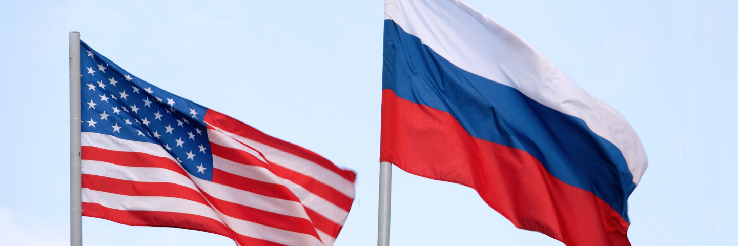 The Russian and American flags flying side by side