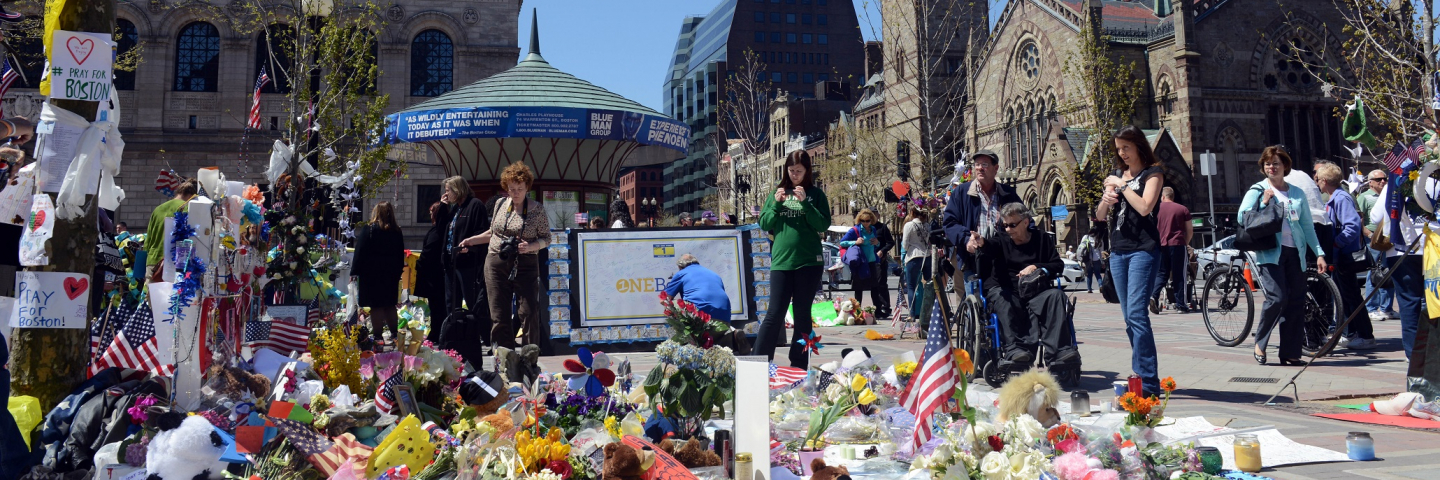 Visitors to Boston’s Copley Square look at a memorial to victims of the April 2013 Boston Marathon bombing