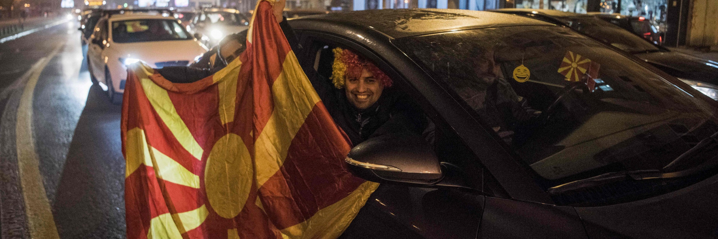 Macedonians supporters wave national flags