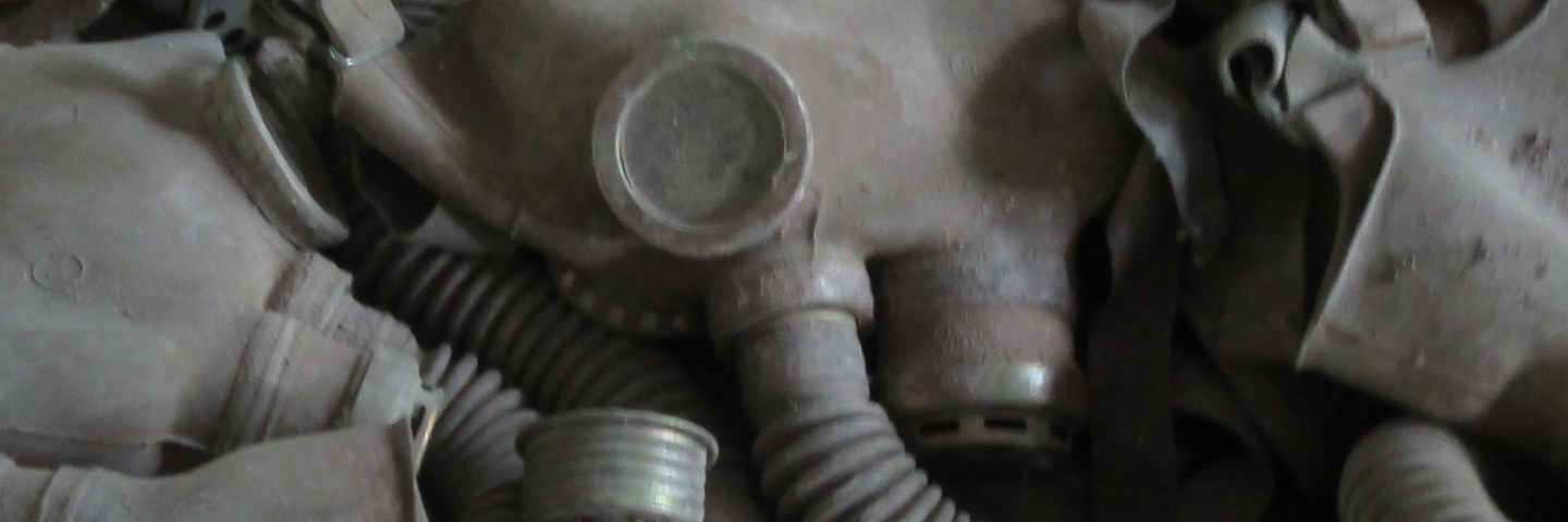 A pile of gas old weathered gas mask.