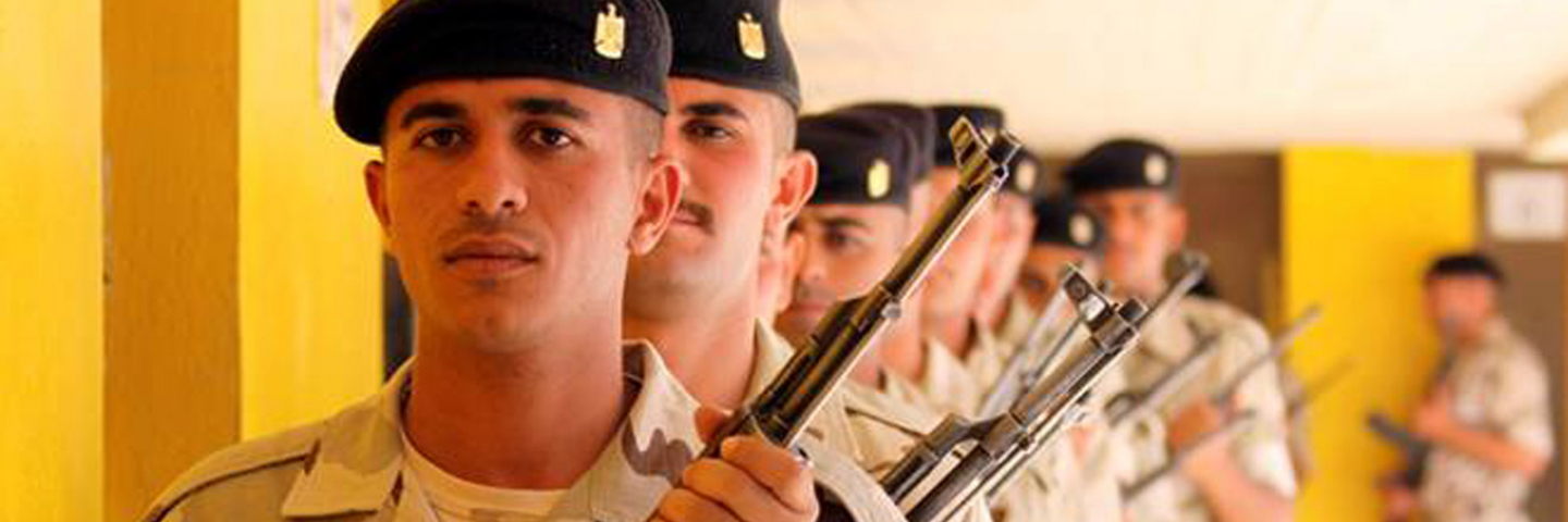Iraqi Officer cadets being introduced to Rifle Drill