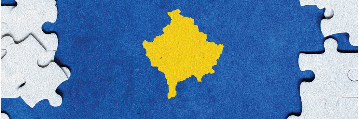 Kosovo flag surrounded by puzzle pieces