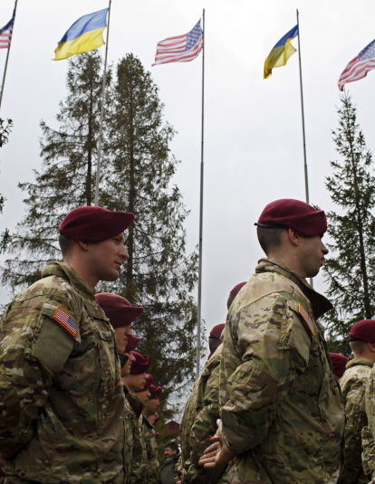 Members of the American 173rd Airborne unit stand at attention during the opening ceremony for Operation Fearless Guardian on April 20, 2015 at the International Peacekeeping and Security Center near Yavoriv, Ukraine. 