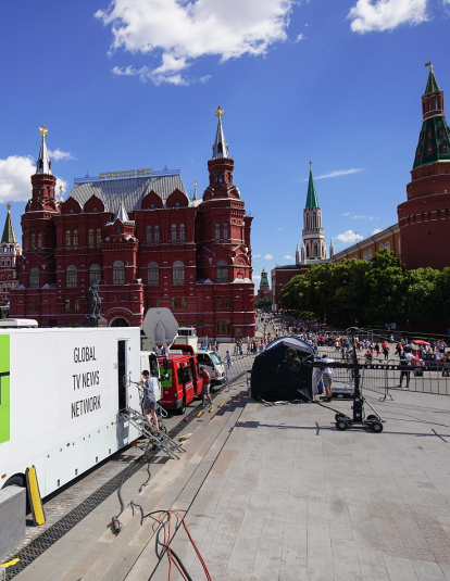 A photograph of an RT news van in Red Square, Moscow, Russia.