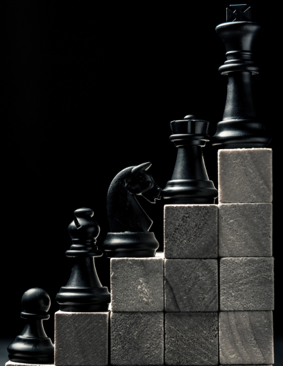 A photo of chess pieces. 