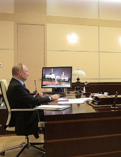Photo of President Putin in a video confrence for COVID-19.