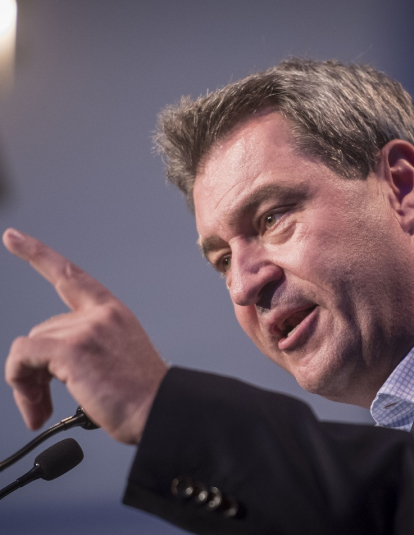 A photograph of Markus Soeder, Governor of Bavaria and lead candidate for the Bavarian Social Union(CSU), the Bavarian Christian Democrats, speaks at a CSU election rally on October 9, 2018 in Wurzburg, Germany.