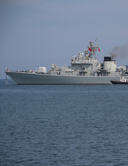 A photograph of a Chinese warship at sea.