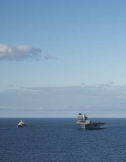 A photograph of the Royal Navy frigates HMS Iron Duke (F234), left, and HMS Westminster (F237), the Royal Norwegian Navy frigate KNM Helge Ingstad (F313), the Royal Navy aircraft carrier HMS Queen Elizabeth (R08), the U.S. Navy guided-missile destroyer USS Donald Cook (DDG-75), the aircraft carrier USS George H.W. Bush (CVN-77), and the guided-missile cruiser USS Philippine Sea (CG-58) underway in formation during exercise "Saxon Warrior 2017", 8 August 2017.