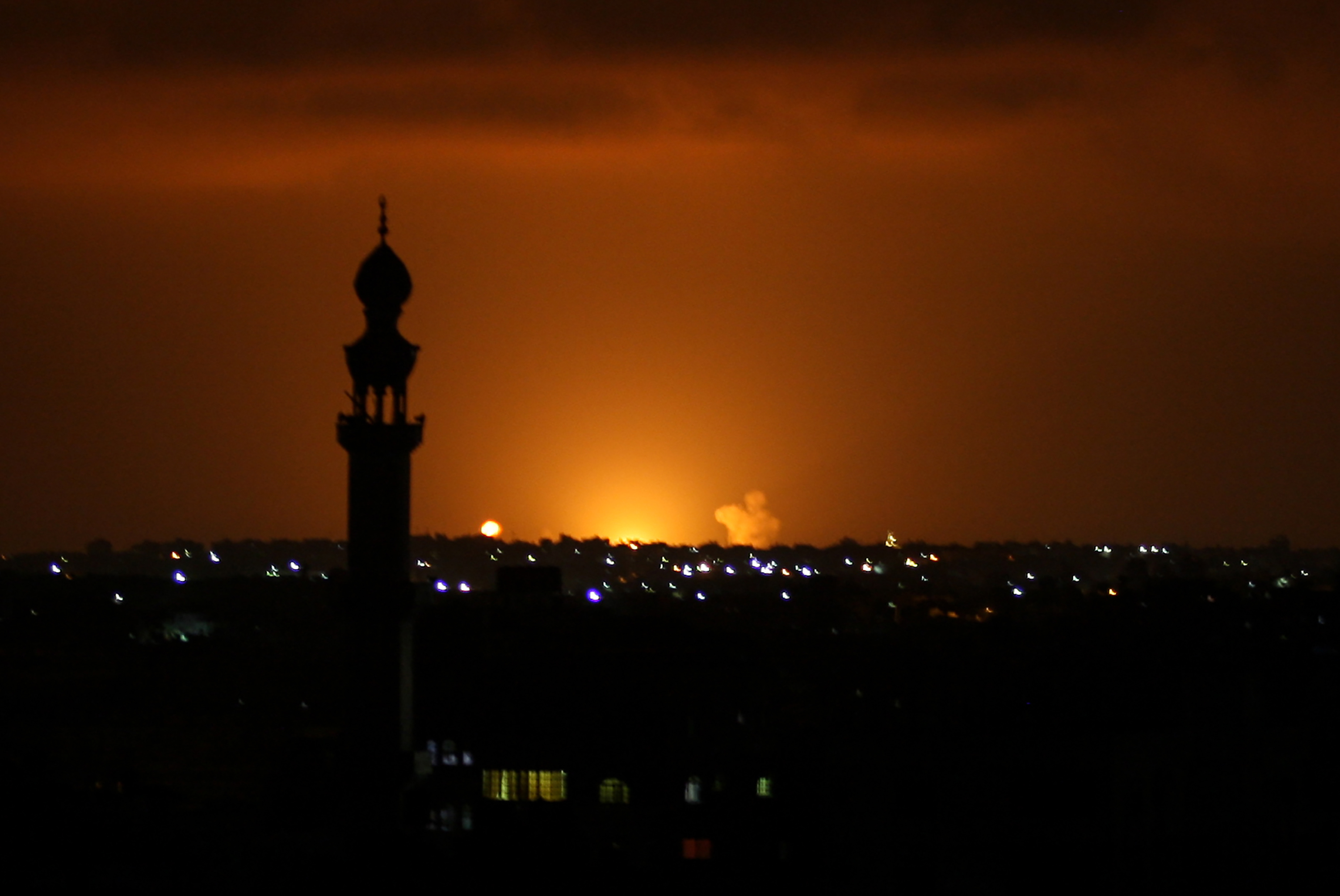 Smoke and flames are seen following an Israeli air strike in the Khan Yunis town of the southern Gaza Strip on September 16, 2020. 