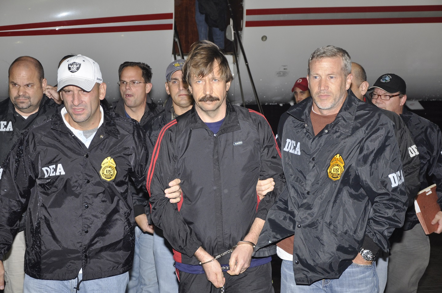 Former Soviet military officer and arms trafficking suspect Viktor Bout deplanes after arriving at Westchester County Airport November 16, 2010 in White Plains, New York.