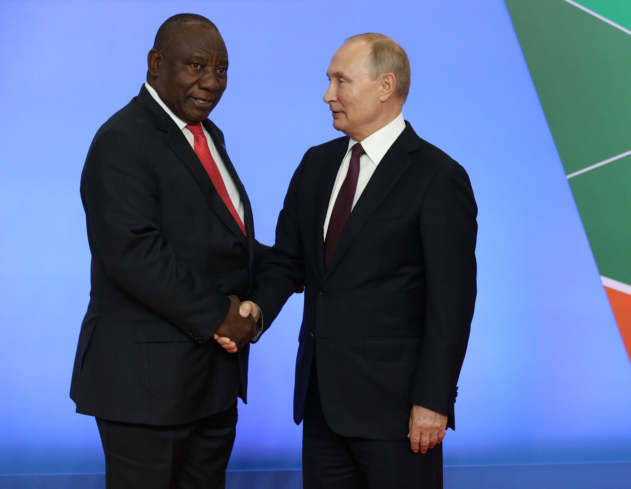 Russian President Vladimir Putin (R) greets South African President Cyril Ramaphosa (L) during the welcoming ceremony at the Russia-Africa Summit in Black Sea resort of Sochi, Russia, October 23, 2019.