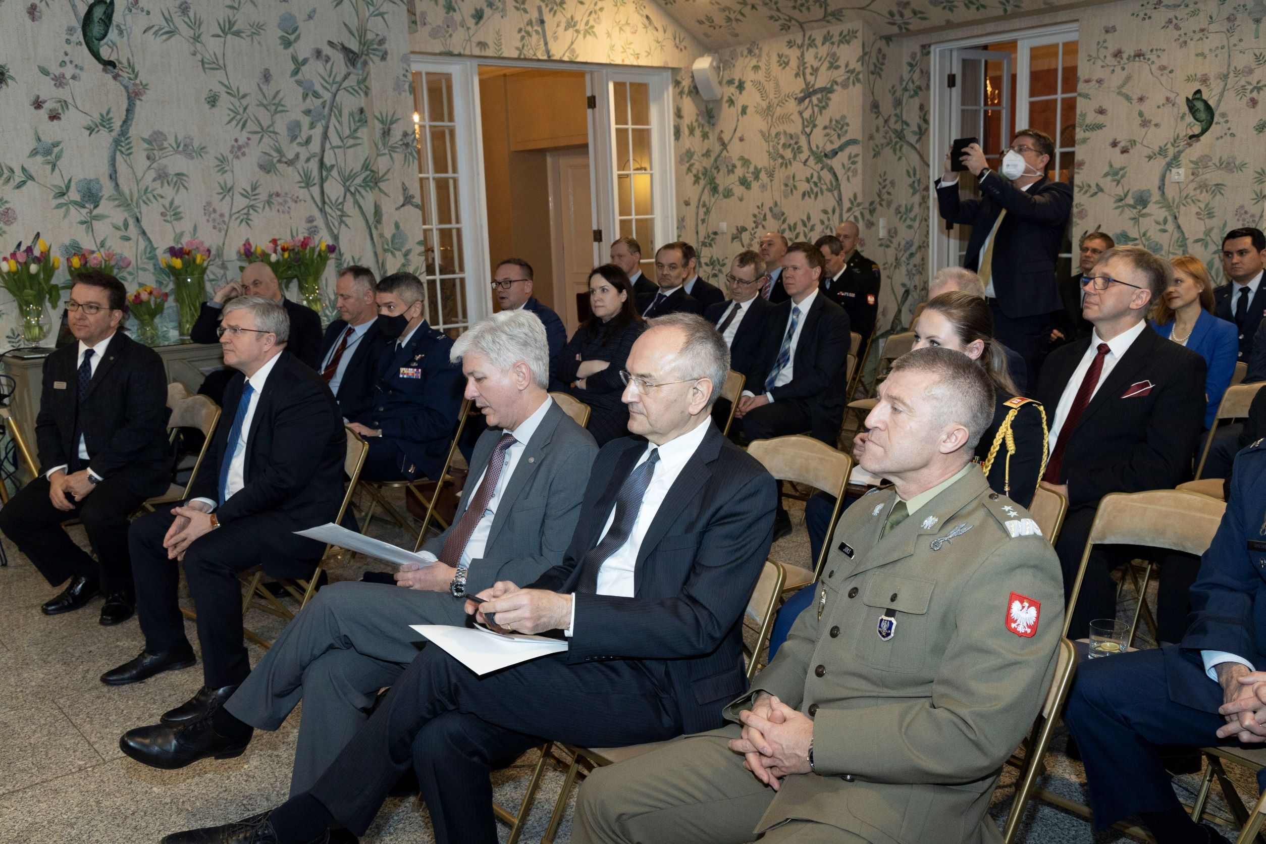 Seated gathering of attendees at the Marshall Center's Polish Alumni Event