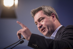 A photograph of Markus Soeder, Governor of Bavaria and lead candidate for the Bavarian Social Union(CSU), the Bavarian Christian Democrats, speaks at a CSU election rally on October 9, 2018 in Wurzburg, Germany.